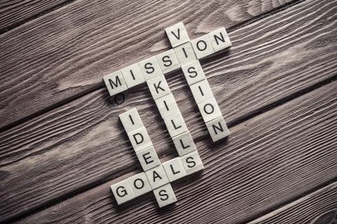 Conceptual business keywords on table with elements of game maki Stock Photos