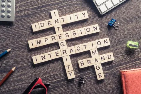 Conceptual business keywords on table with elements of game maki Stock Photos
