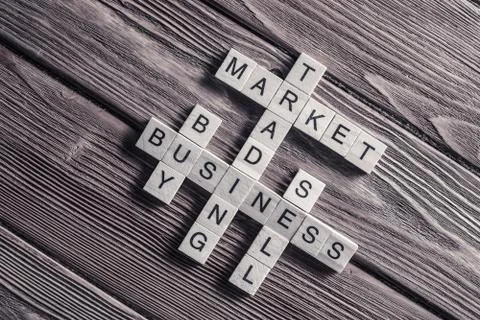 Conceptual business keywords on table with elements of game maki Stock Photos