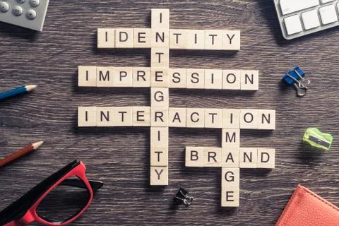 Conceptual business keywords on table with elements of game maki Stock Photos