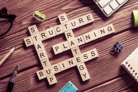 Conceptual business keywords on table with elements of game maki Stock Photos