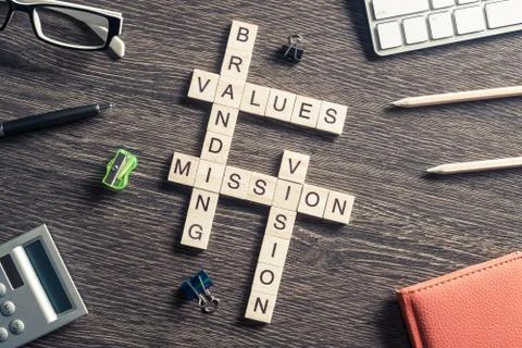 Conceptual business keywords on table with elements of game maki Stock Photos