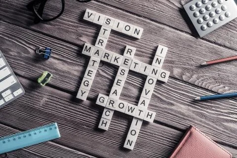 Conceptual business keywords on table with elements of game maki Stock Photos