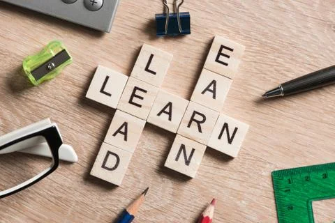 Conceptual business keywords on table with elements of game making crossword Stock Photos