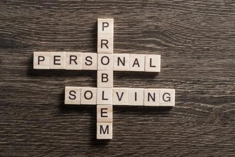 Conceptual business keywords on table with elements of game making crossword Stock Photos