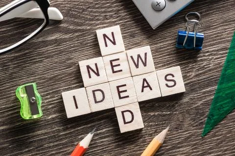 Conceptual business keywords on table with elements of game making crossword 写真素材