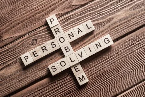 Conceptual business keywords on table with elements of game making crossword Stock Photos