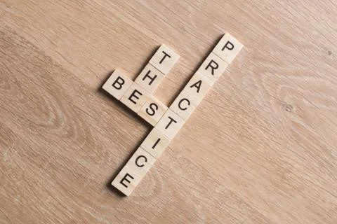 Conceptual business keywords on table with elements of game making crossword 스톡 사진