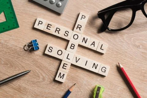Conceptual business keywords on table with elements of game making crossword 스톡 사진