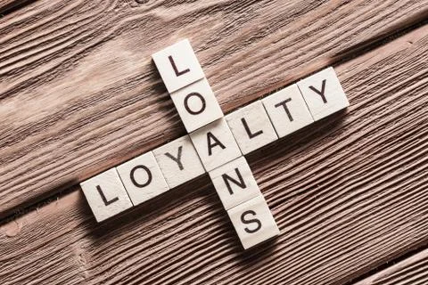 Conceptual business keywords on table with elements of game making crossword Stock Photos