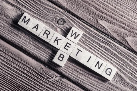 Conceptual business keywords on table with elements of game maki Stock Photos