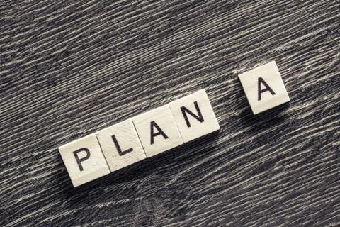 Conceptual business keywords on table with elements of game maki Stock Photos