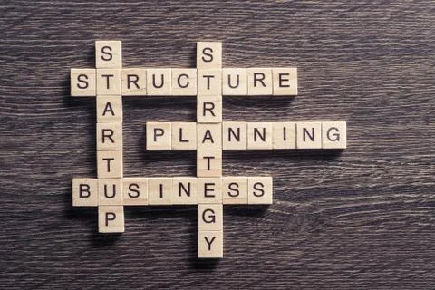 Conceptual business keywords on table with elements of game maki Stock Photos
