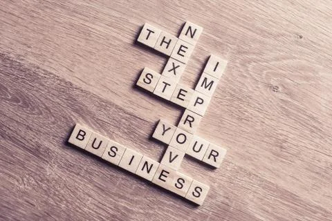 Conceptual business keywords on table with elements of game maki Stock Photos