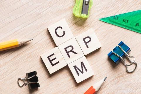 Conceptual business keywords on table with elements of game making crossword Stock Photos