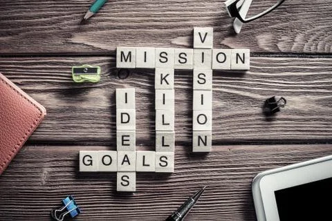 Conceptual business keywords on table with elements of game maki Stock Photos