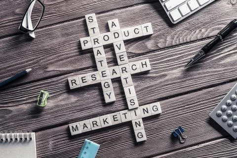 Conceptual business keywords on table with elements of game maki Stock Photos