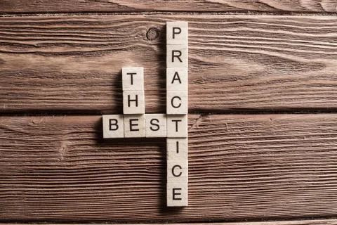 Conceptual business keywords on table with elements of game making crossword Stock Photos
