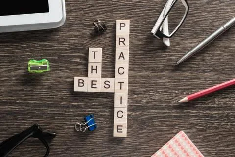 Conceptual business keywords on table with elements of game making crossword Stock Photos