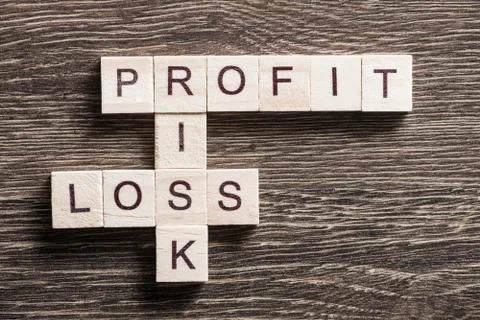 Conceptual business keywords on table with elements of game making crossword Stockfoto's