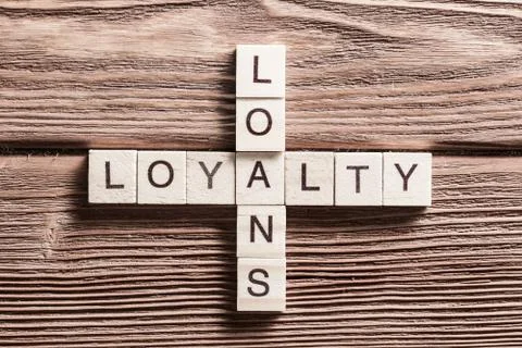 Conceptual business keywords on table with elements of game making crossword 스톡 사진
