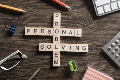 Conceptual business keywords on table with elements of game making crossword Stock Photos