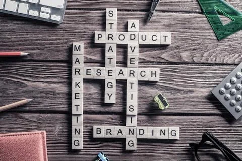 Conceptual business keywords on table with elements of game maki Stock Photos