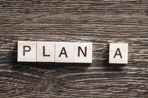 Conceptual business keywords on table with elements of game making crossword Stockfoto's