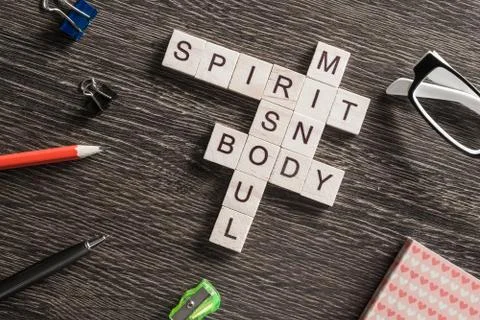 Conceptual business keywords on table with elements of game making crossword Stockfoto's