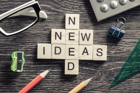 Conceptual business keywords on table with elements of game making crossword Stockfoto's