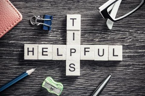 Conceptual business keywords on table with elements of game making crossword Foto stock