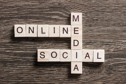Conceptual business keywords on table with elements of game making crossword Stock Photos
