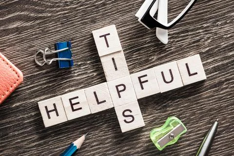 Conceptual business keywords on table with elements of game making crossword Stock Photos