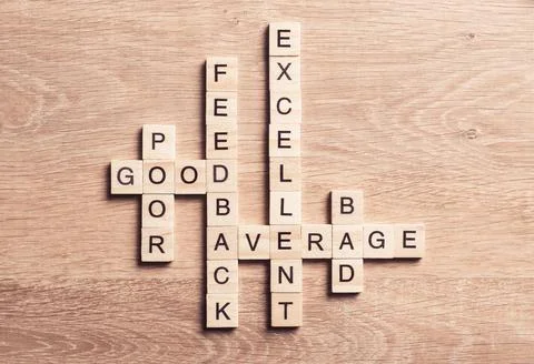 Conceptual business keywords on table with elements of game making crossword 스톡 사진