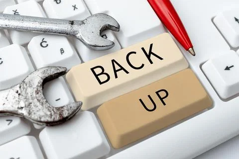 Conceptual caption Back Up. Business overview saving important data into Stock Photos