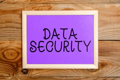 Conceptual caption Data Security. Word Written on Confidentiality Disk Stock Photos