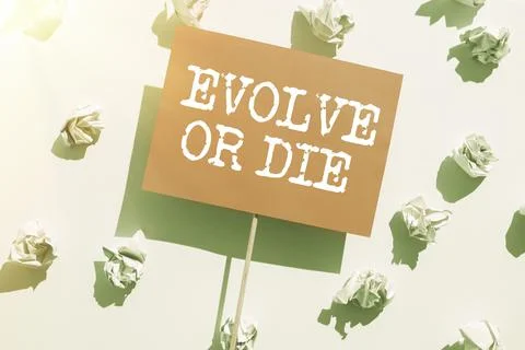 Conceptual caption Evolve Or Die. Business approach Necessity of change grow Stock Photos