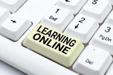 Conceptual caption Learning Online. Word Written on Learn something new with the Fotos de archivo