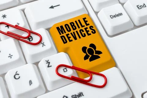 Conceptual caption Mobile Devices. Internet Concept A portable computing device Stock Photos