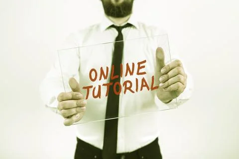 Conceptual caption Online Tutorial. Word Written on An individual is being Fotos Stock
