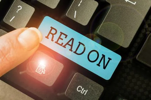 Conceptual caption Read On. Business idea spend time reading in order to find Stock Photos