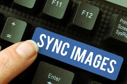 Conceptual caption Sync Images. Internet Concept Making photos identical in all Stock Photos