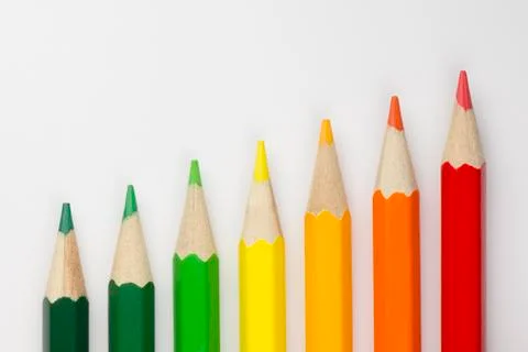 Conceptual crayons as energy label colors. Stock Photos