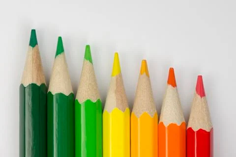 Conceptual crayons as energy label colors. Stock Photos