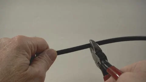 Conceptual - Cutting off cable TV Stock Footage 198905593