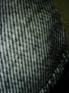 Conceptual dark textile pattern with different elements  with shadows and lig Stock Photos