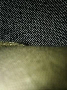 Conceptual dark textile pattern with different elements  with shadows and lig Stock Photos