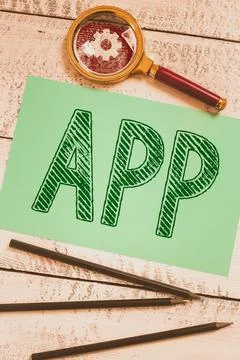 Conceptual display App. Word for computer or software application designed to Stock Photos