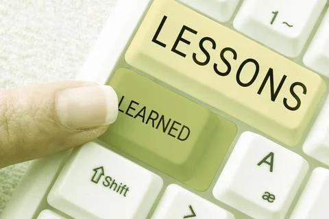 Conceptual display Lessons Learned. Word Written on experiences garnered from Stock Photos