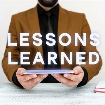 Conceptual display Lessons Learned. Word for Promote share and use knowledge 写真素材